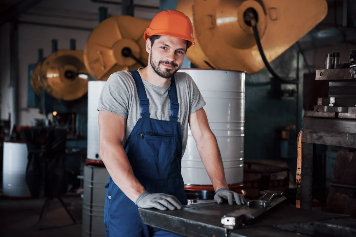 portrait-young-worker-hard-hat-large-metalworking-plant